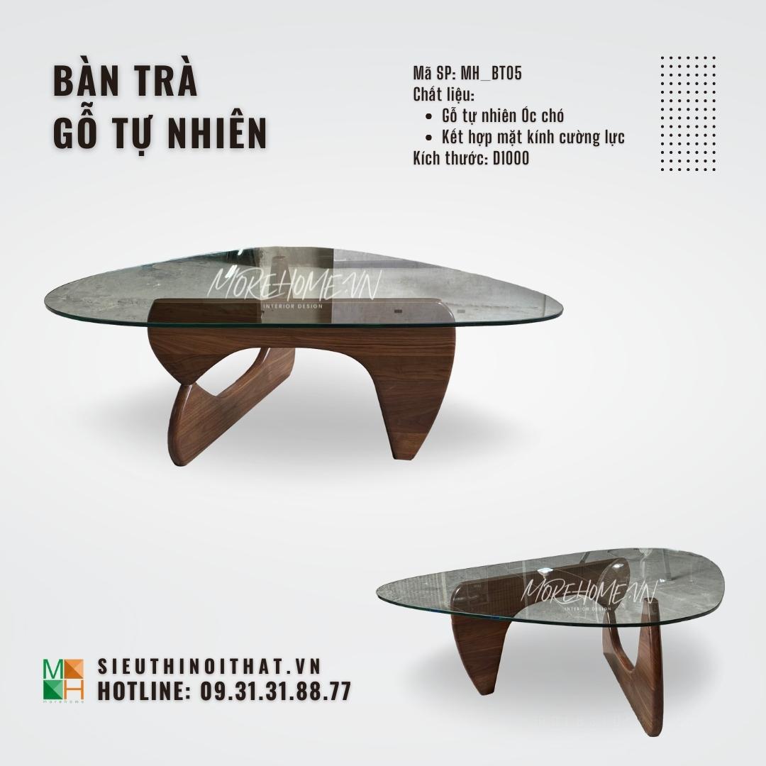 Bàn trà gỗ tự nhiên mặt kính kiểu dáng độc đáo, tạo ấn tượng mạnh cho không gian cũng như sử dụng tiện nghi, thẩm mỹ cao cho gia chủ
